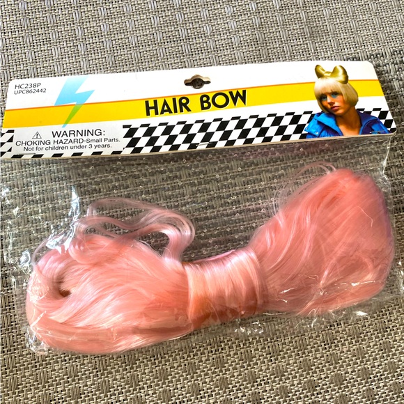 Accessories - New in Package Pink Faux Hair Bow Clip in!